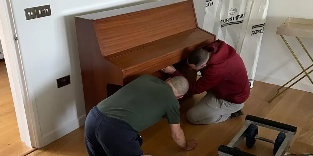 London piano moving team